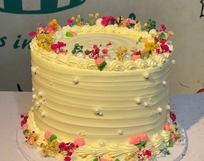 Elegant celebration cake with gold detail