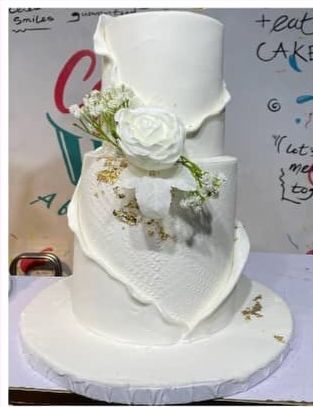 Tiered wedding cake by Cakes by Sadee